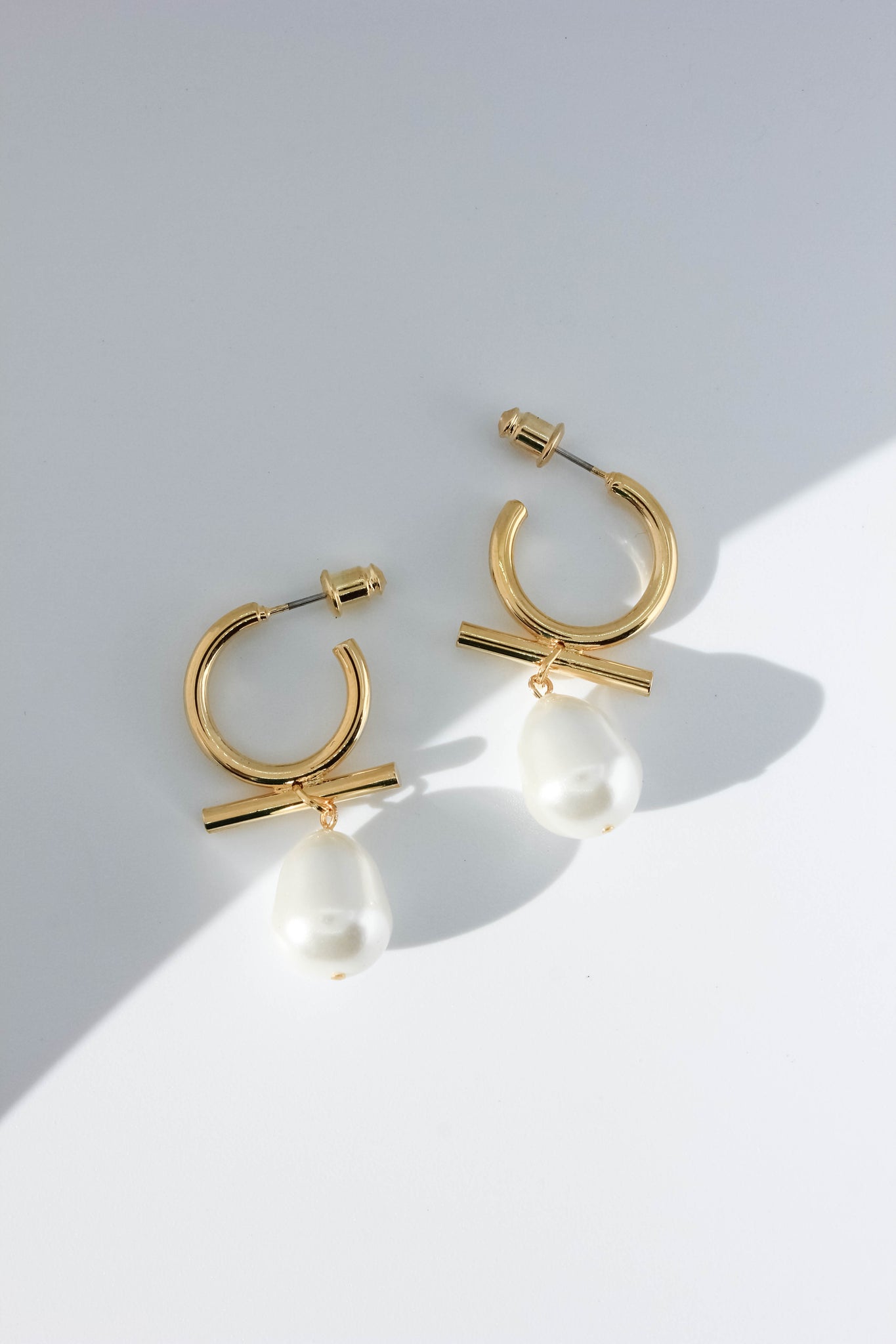 Modern Pearl Huggie Earrings