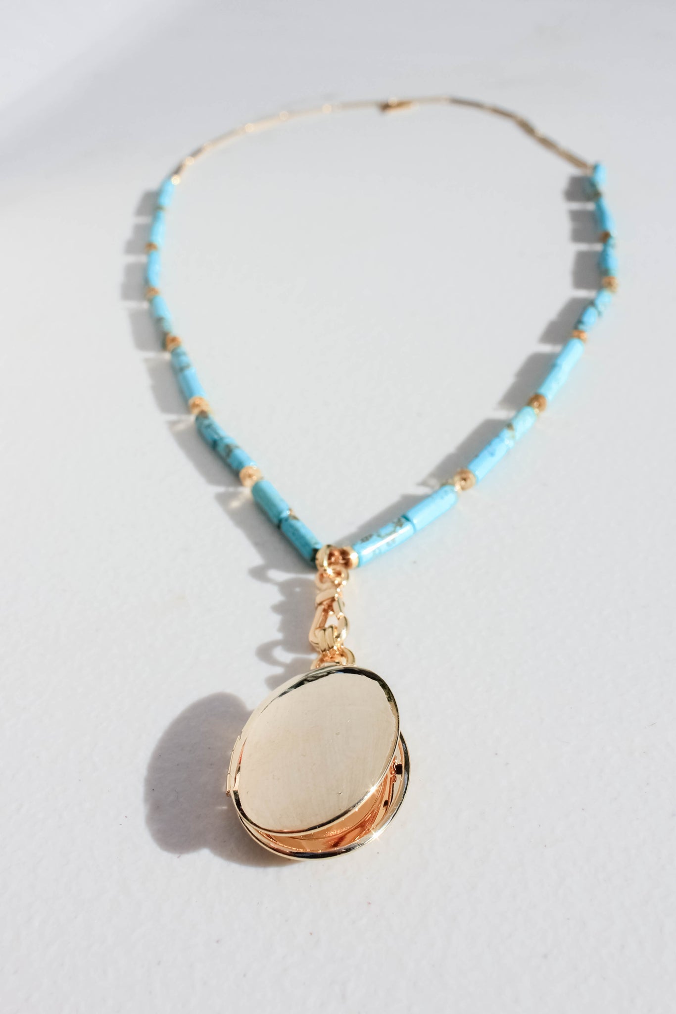 Long Turquoise Beaded Necklace with Gold Locket